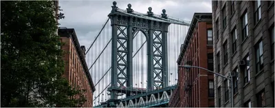 Produktbild von Wallario Poster - Brücke zwischen Häusern, Kunstdruck Größe: 50 x 125 cm