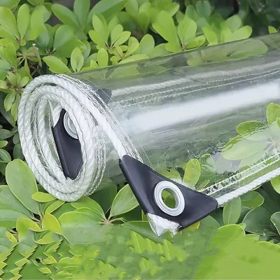 Imagen del producto de Lona transparente con ojales, de 2,4 x 2 metros, fabricada en PVC impermeable, ideal para jardín y balcón