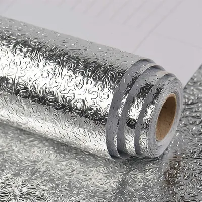 A roll of silver foil with a textured pattern.