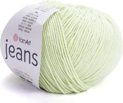 A ball of light green yarn with a label.