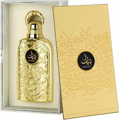 A gold perfume bottle and its packaging are displayed.