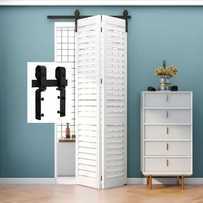 A white folding screen and a white dresser are shown in a room with blue walls.