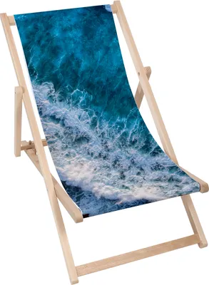 A wooden deck chair with a fabric seat featuring a print of ocean waves.