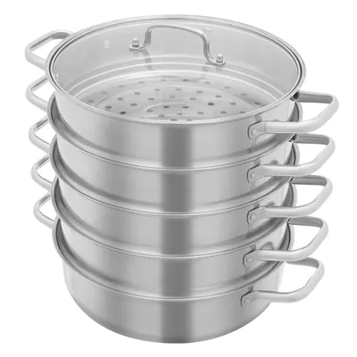 A stack of stainless steel steaming pots with a glass lid.