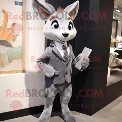 Produktbild von Silbernes REDBROKOLY Reh Maskottchen Kostüm gekleidet in eine Anzugjacke und Geldbörsen