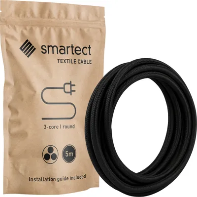A product shot of a black textile cable next to its packaging.