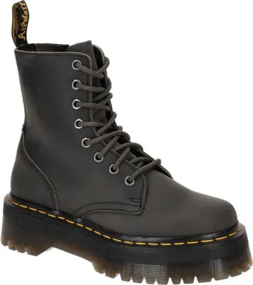 A single Dr. Martens boot is shown against a white background.