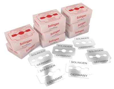Immagine prodotto di SCHWERTKRONE® - Lame per pialla per calli [PRODOTTO A SOLINGEN - GERMANIA] - Lame per pialla per calli - Lame di ricambio per pialla per calli - Lame professionali di  - Confezionate singolarmente (80 pezzi)