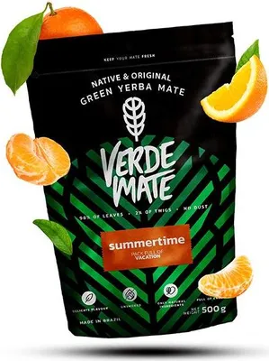 A bag of Verde Mate green yerba mate with orange slices and leaves surrounding it.