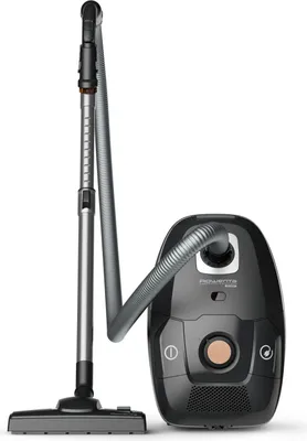 A black Rowenta vacuum cleaner with its hose and wand attached, shown against a white background.