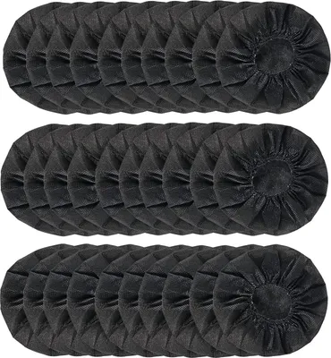 A stack of black disposable headphone covers.