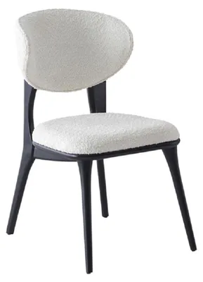 Image de Chaise moderne, blanche et noire, élégante, idéale pour une salle à manger. Fauteuil rembourré