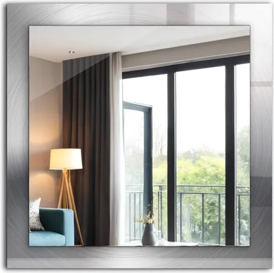 A mirror reflecting a room with a lamp, sofa, and a large window overlooking greenery.