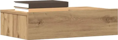 A wooden bedside table with two books on top.
