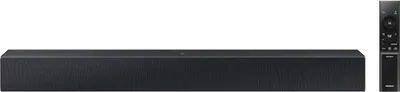 A black soundbar and its remote control are displayed against a white background.