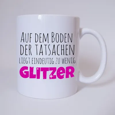 Produktbild von TassenKing Auf dem Boden der Tatsachen liegt eindeutig zu wenig Glitzer - Tasse - Kaffeetasse - Tasse mit Spruch