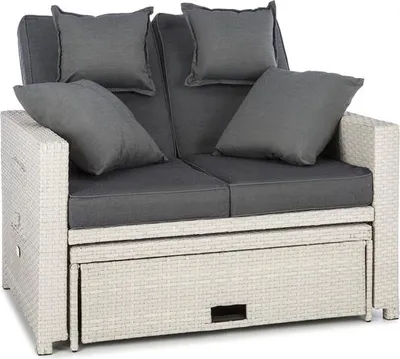 A white and gray rattan sofa with cushions and a pull-out footrest.