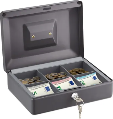 An open gray metal cash box with compartments for coins and banknotes, and a key in the lock.