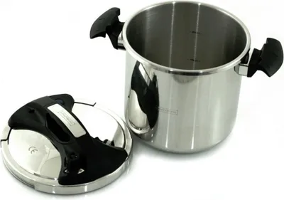 A stainless steel pressure cooker with its lid detached, placed on a white background.