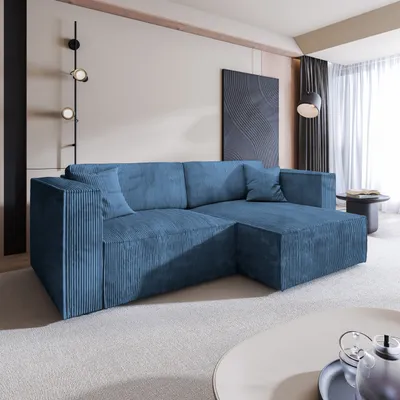 A modern living room with a blue sectional sofa.
