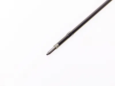 A close-up shot of a pen refill on a white background.