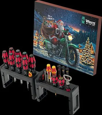 A Wera Advent Calendar with a Christmas-themed illustration of Santa on a motorcycle, displayed with a set of screwdrivers and tools.