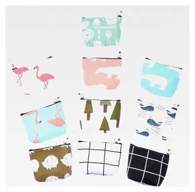 Produktbild von 10 Stück Kleine Cartoon Schlüsseltaschen aus Canvas mit Reißverschluss für Münzen und Schlüsselaufbewahrung für Alltag und Reisen