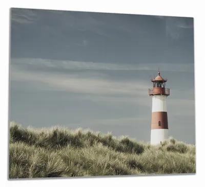 Produktbild von Wallario Herdabdeckplatte aus Glas, Größe 60 x 52 cm 1-teilig, Motiv Leuchtturm auf der Düne am Strand