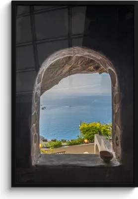 Produktbild von MuchoWow® MuchoWow® Gerahmtes Poster Blick auf das Meer durch ein Steinfenster 60x90 cm - Poster mit zchwarzem Bilderrahmen - Kunst