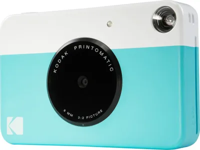 A close-up studio shot of a Kodak Printomatic instant camera.