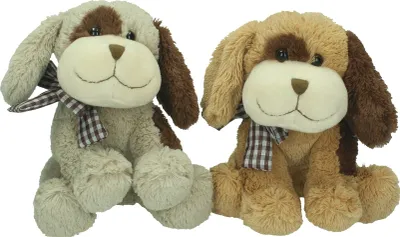 Two plush toy dogs sitting side-by-side against a white background.