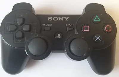 A black Sony PlayStation 3 controller is shown against a white background.