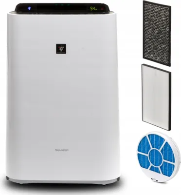 A white Sharp air purifier is shown with three replacement filters to its right.