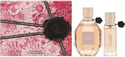 A gift set of Viktor & Rolf Flowerbomb perfume, including a large bottle and a travel-sized bottle, alongside the product packaging.