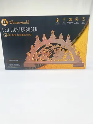 Zdjęcie produktu dla Świąteczna dekoracja LED "Winterworld" z drewna, 45 cm, przedstawiająca Świętego Mikołaja, z timerem i efektami świetlnymi 3D