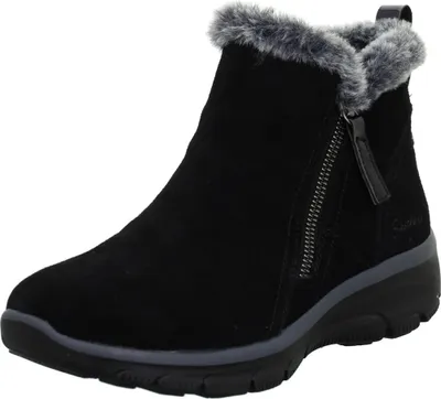 A black boot with gray fur trim and a gray sole is shown against a white background.