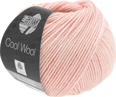 A ball of pink yarn with a label.