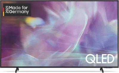 A Samsung QLED TV displaying a colorful, abstract image.