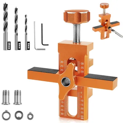 A set of woodworking tools, including a jig and drill bits, displayed on a white background.