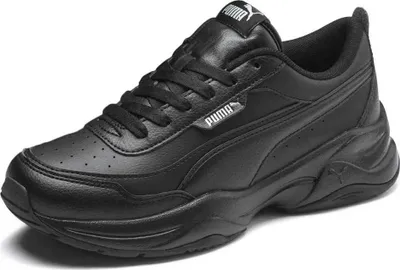 A black Puma Cilia Mode sneaker is shown from a side angle against a white background.