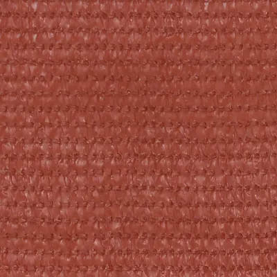 A close-up, textured view of terracotta red fabric.