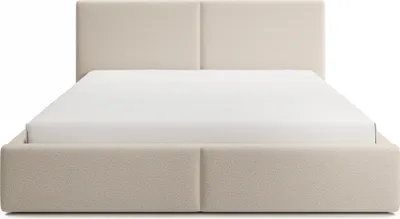 A beige upholstered bed frame with a mattress.