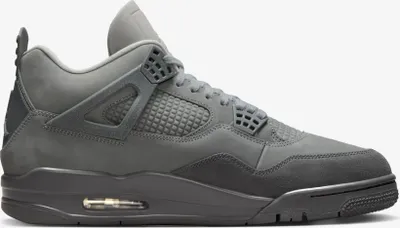 A side view of a gray Nike Air Jordan 4 Retro SE sneaker against a white background.