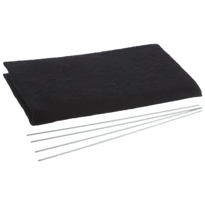 A black fabric filter mat and several thin metal rods are laid out on a white background.