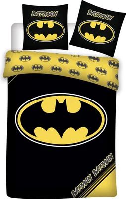 A Batman-themed duvet cover and pillowcase set laid out on a white surface.