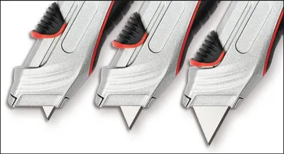 Produktbild von Cutter Safety Profi Trapezklinge incl. 5 Ersatzklingen schwarz Packung mit 12 Stück