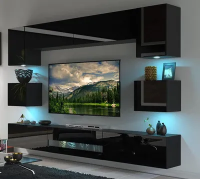 A modern living room entertainment unit with a wall-mounted TV and shelving.
