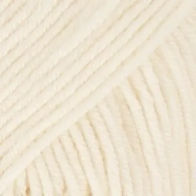 A close-up view of off-white yarn.