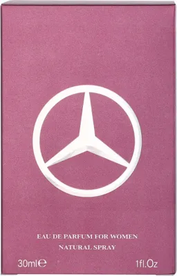 A close-up of a perfume box with the Mercedes-Benz logo.