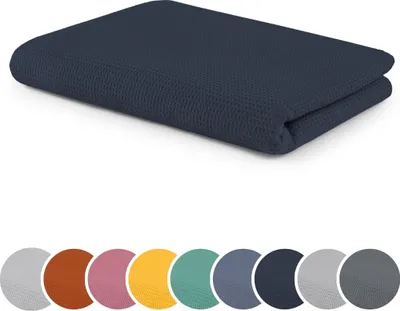 Produktbild von sleepling Kuscheldecke Waffeloptik, Sofadecke, hautsympathisch, temperaturregulierend, 100% Baumwolle,  100, waschbar, 150 x 200 cm, navy